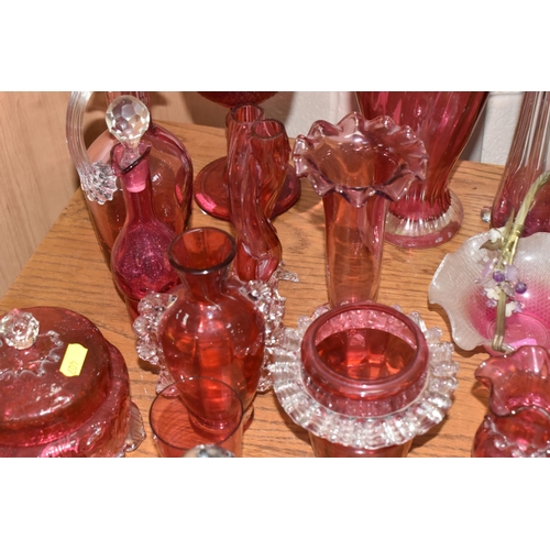 407 - A COLLECTION OF TWENTY-SIX CRANBERRY GLASS ITEMS to include a pair of wine glasses, three baskets (o... 