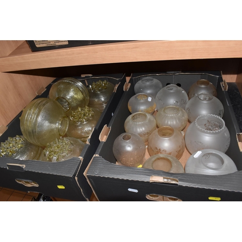 408 - FOUR BOXES OF VINTAGE GLASS LAMP SHADES to include a box of eight mid-century spherical glass hangin... 