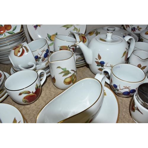 432 - A LARGE COLLECTION OF ROYAL WORCESTER EVESHAM DINNERWARE comprising one teapot (light staining to th... 