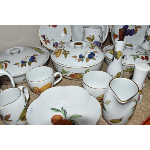 432 - A LARGE COLLECTION OF ROYAL WORCESTER EVESHAM DINNERWARE comprising one teapot (light staining to th... 