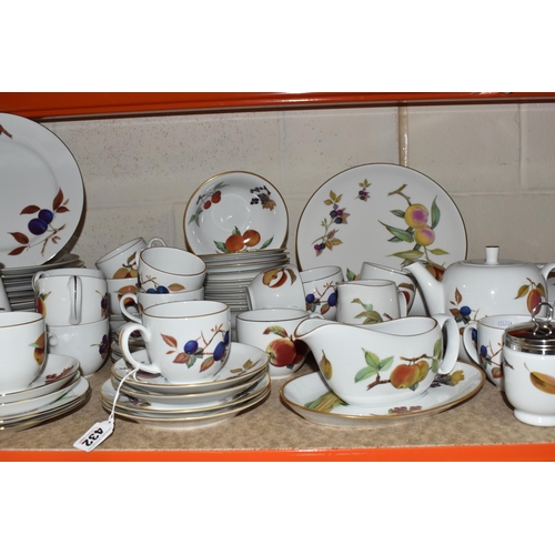 432 - A LARGE COLLECTION OF ROYAL WORCESTER EVESHAM DINNERWARE comprising one teapot (light staining to th... 