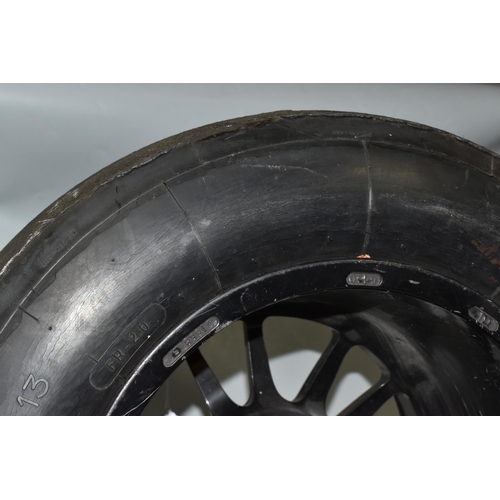 449 - A FORMULA RENAULT RACE SERIES WHEEL, with Michelin 23/57-13 tyre, the rim printed 'Formula Renault' ... 