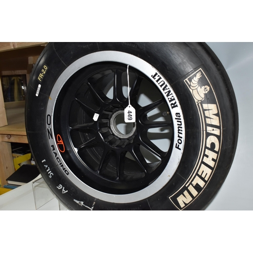 449 - A FORMULA RENAULT RACE SERIES WHEEL, with Michelin 23/57-13 tyre, the rim printed 'Formula Renault' ... 