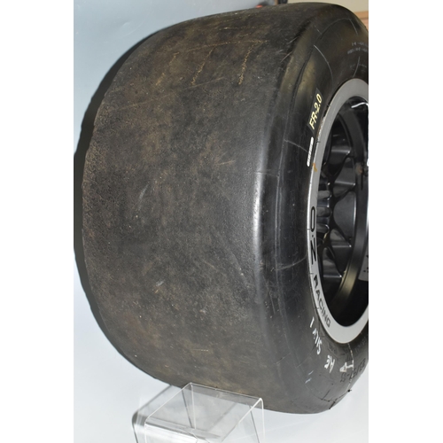 449 - A FORMULA RENAULT RACE SERIES WHEEL, with Michelin 23/57-13 tyre, the rim printed 'Formula Renault' ... 