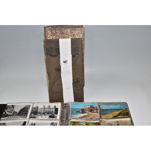 467 - TWO ALBUMS OF POSTCARDS containing approximately 609 examples, mostly from the early 20th century, s... 