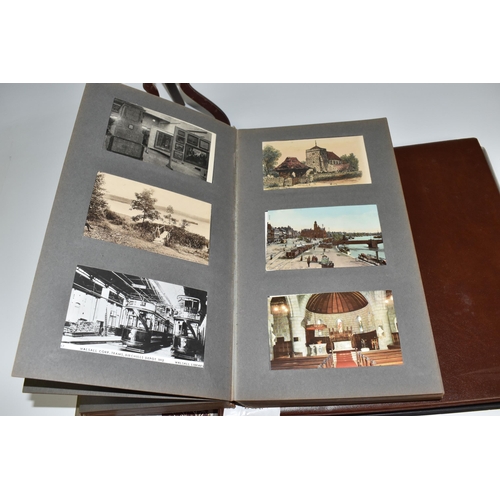 467 - TWO ALBUMS OF POSTCARDS containing approximately 609 examples, mostly from the early 20th century, s... 