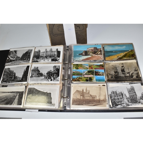 467 - TWO ALBUMS OF POSTCARDS containing approximately 609 examples, mostly from the early 20th century, s... 