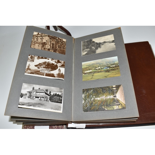 467 - TWO ALBUMS OF POSTCARDS containing approximately 609 examples, mostly from the early 20th century, s... 