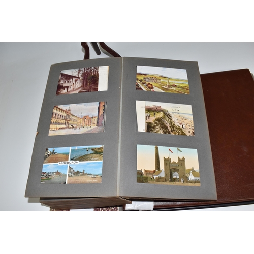 467 - TWO ALBUMS OF POSTCARDS containing approximately 609 examples, mostly from the early 20th century, s... 