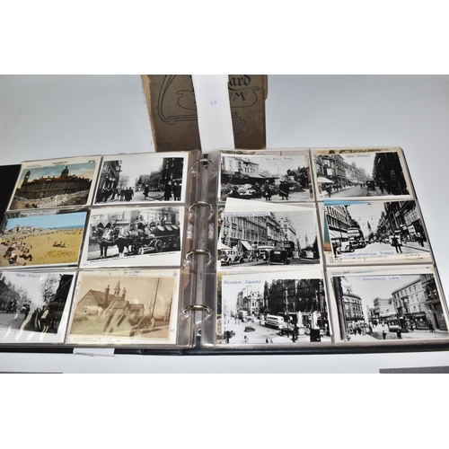 467 - TWO ALBUMS OF POSTCARDS containing approximately 609 examples, mostly from the early 20th century, s... 