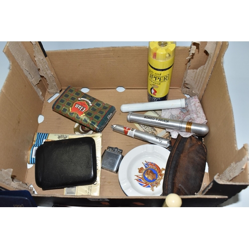 472 - A BOX OF CIGAR RELATED ITEMS, to include a pack of twenty-five Puros Canarios, three cigars in metal... 