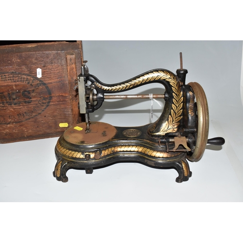 476 - AN 1890'S JONES' SERPENTINE SEWING MACHINE, a hand-crank 'Swan necked' sewing machine with original ... 