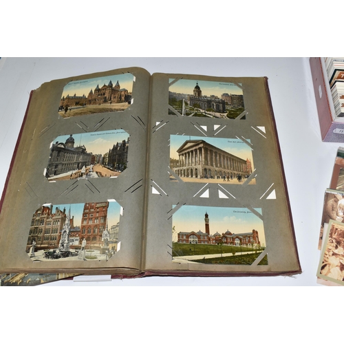 480 - ONE ALBUM AND ONE BOX OF POSTCARDS, the album contains 250 early -mid 20th century examples featurin... 