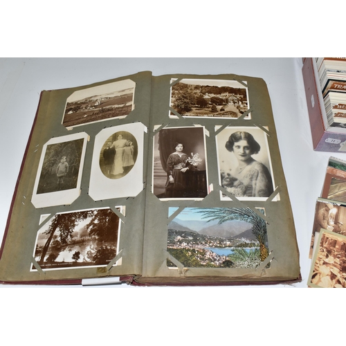 480 - ONE ALBUM AND ONE BOX OF POSTCARDS, the album contains 250 early -mid 20th century examples featurin... 