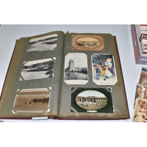 480 - ONE ALBUM AND ONE BOX OF POSTCARDS, the album contains 250 early -mid 20th century examples featurin... 