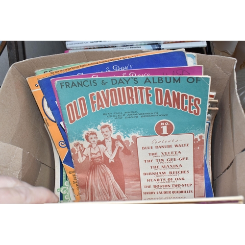 490 - TWO BOXES OF BOOKS AND SHEET MUSIC, a collection of original  Francis & day's music albums to includ... 