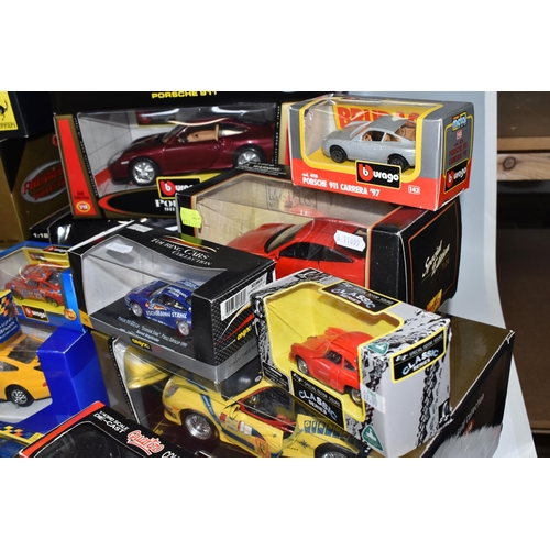 493 - TWO BOXES OF BOXED COLLECTABLE MODEL PORCHE CARS, to include ten boxed 1:18 assorted model Porche ca... 