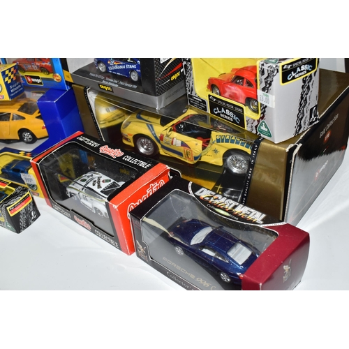 493 - TWO BOXES OF BOXED COLLECTABLE MODEL PORCHE CARS, to include ten boxed 1:18 assorted model Porche ca... 