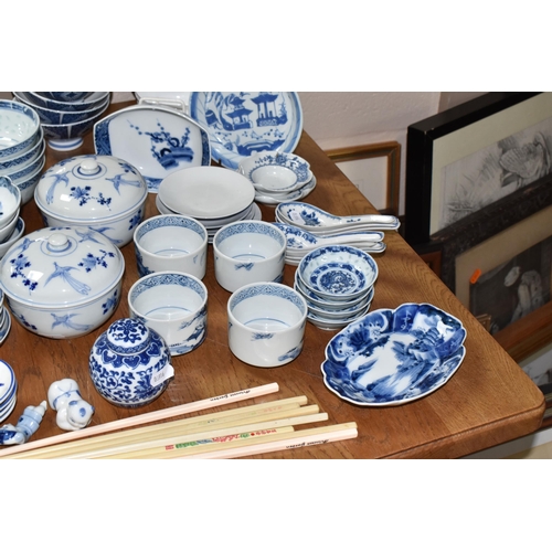 516 - A LARGE QUANTITY OF BLUE AND WHITE MOSTLY CHINESE CERAMICS to include three blue and white bowls wit... 