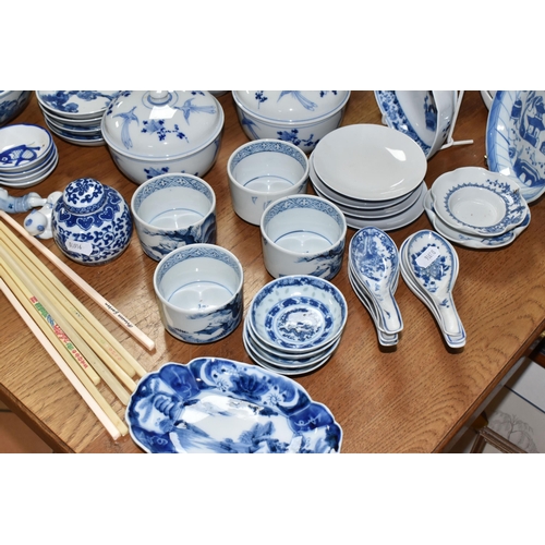 516 - A LARGE QUANTITY OF BLUE AND WHITE MOSTLY CHINESE CERAMICS to include three blue and white bowls wit... 