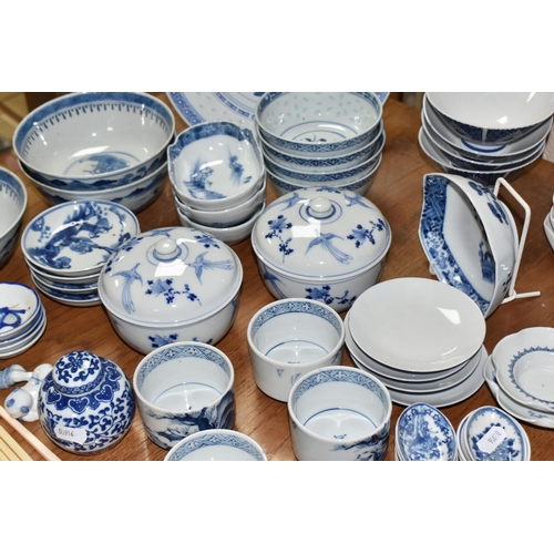 516 - A LARGE QUANTITY OF BLUE AND WHITE MOSTLY CHINESE CERAMICS to include three blue and white bowls wit... 