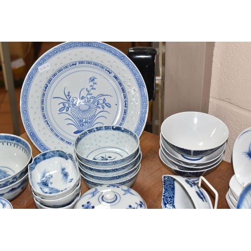 516 - A LARGE QUANTITY OF BLUE AND WHITE MOSTLY CHINESE CERAMICS to include three blue and white bowls wit... 