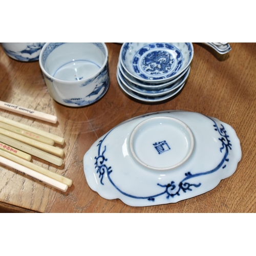 516 - A LARGE QUANTITY OF BLUE AND WHITE MOSTLY CHINESE CERAMICS to include three blue and white bowls wit... 