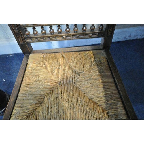 1199 - A 20TH CENTURY OAK DRAW LEAF BRETON TABLE, with a scrolled and wavy apron, raised on male and female... 