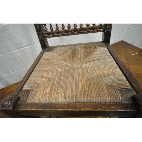 1199 - A 20TH CENTURY OAK DRAW LEAF BRETON TABLE, with a scrolled and wavy apron, raised on male and female... 