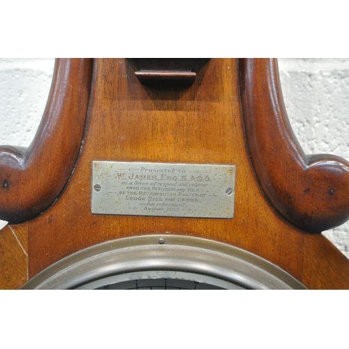 1200 - A VICTORIAN MAHOGANY BAROMETER, fitted with a thermometer, above a 9 inch dial, signed Negretti and ... 