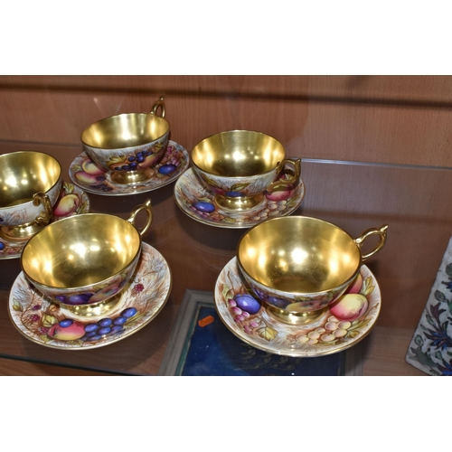 374 - SEVEN AYNSLEY ORCHARD GOLD TEACUPS AND SAUCERS, each teacup with gilt interior, rim, handle and foot... 