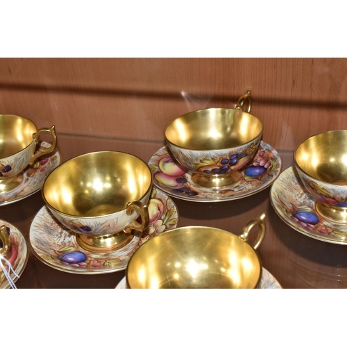 374 - SEVEN AYNSLEY ORCHARD GOLD TEACUPS AND SAUCERS, each teacup with gilt interior, rim, handle and foot... 