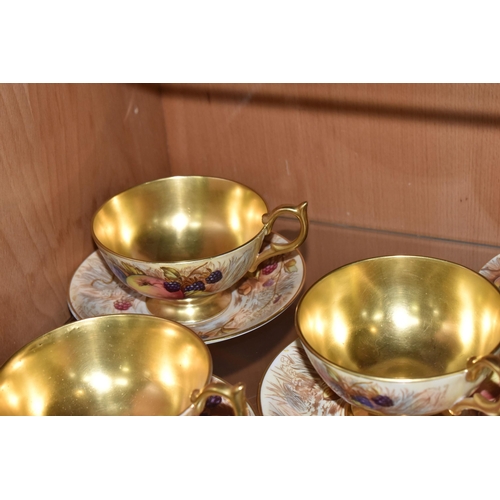 374 - SEVEN AYNSLEY ORCHARD GOLD TEACUPS AND SAUCERS, each teacup with gilt interior, rim, handle and foot... 