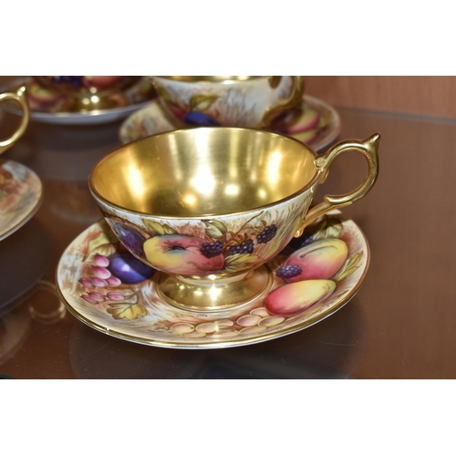 374 - SEVEN AYNSLEY ORCHARD GOLD TEACUPS AND SAUCERS, each teacup with gilt interior, rim, handle and foot... 