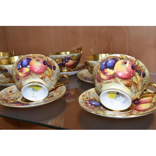 374 - SEVEN AYNSLEY ORCHARD GOLD TEACUPS AND SAUCERS, each teacup with gilt interior, rim, handle and foot... 