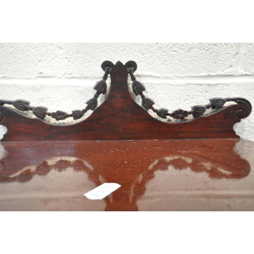 160 - AN EDWARDIAN MAHOGANY PURDONIUM, with a raised back, the fall front door enclosing a metal insert, r... 