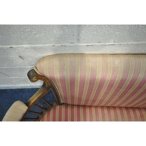 165 - AN EDWARDIAN MAHOGANY AND INLAID SOFA, with striped upholstery, curved armrests, raised on square ta... 