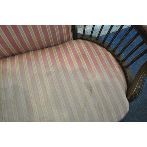 165 - AN EDWARDIAN MAHOGANY AND INLAID SOFA, with striped upholstery, curved armrests, raised on square ta... 