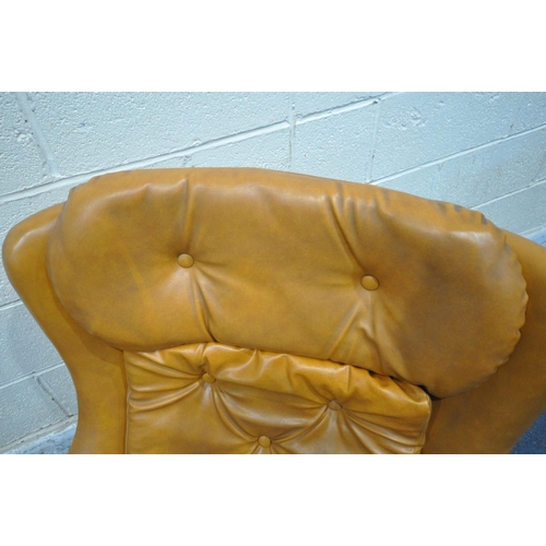 167 - A PAIR OF TANNED LEATHERETTE ROCKING WING BACK ARMCHAIRS, with buttoned head rest, back rest and sea... 