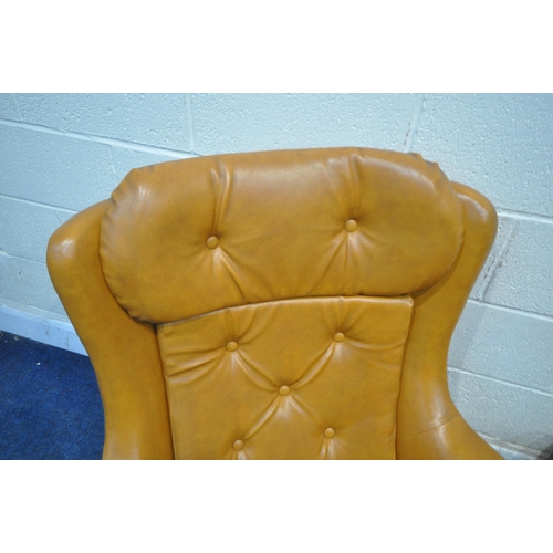 167 - A PAIR OF TANNED LEATHERETTE ROCKING WING BACK ARMCHAIRS, with buttoned head rest, back rest and sea... 