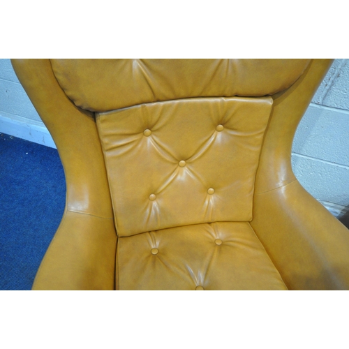 167 - A PAIR OF TANNED LEATHERETTE ROCKING WING BACK ARMCHAIRS, with buttoned head rest, back rest and sea... 