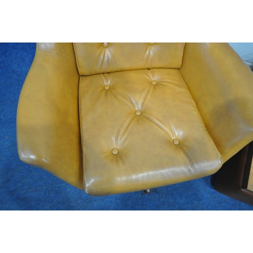 167 - A PAIR OF TANNED LEATHERETTE ROCKING WING BACK ARMCHAIRS, with buttoned head rest, back rest and sea... 