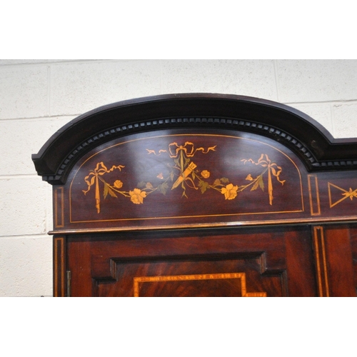 169 - AN EDWARDIAN MAHOGANY, MARQUETRY INLAID AND BOX STUNG BEDROOM SUITE, comprising a triple door compac... 