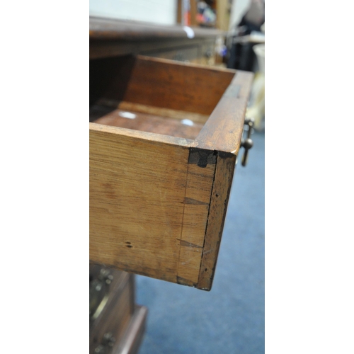 174 - A 20TH CENTURY MAHOGANY TWIN PEDESTAL DESK, with a leather writing surface, and nine assorted drawer... 