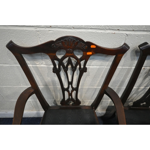 175 - A SET OF SIX CHIPPENDALE STYLE MAHOGANY DINING CHAIRS, including two carvers, with drop in seat pads... 