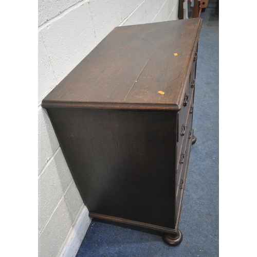 184 - A GEORGIAN OAK CHEST OF TWO SHORT OVER THREE LONG GRADUATED DRAWERS, raised on later bun feet, width... 