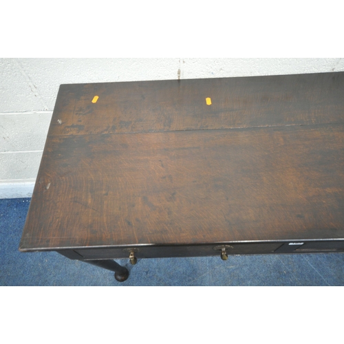 185 - A GEORGIAN OAK SIDE TABLE, with two frieze drawers, raised on cylindrical tapered legs, with pad fee... 