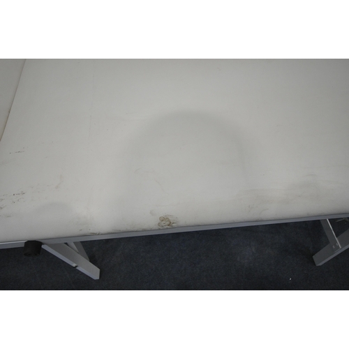 192 - A FOLDING MASSAGE BED, condition report: marks, scuffs, stains, other wear and usage