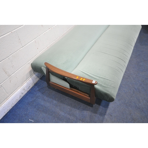 193 - A MID CENTURY TEAK FRAME SOFA BED, with green fabric upholstery, swept open armrests raised on taper... 