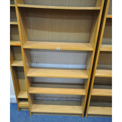 200 - A PAIR OF IKEA OPEN BOOKCASES, width 80cm x depth 28cm x height 202cm, along with a cd rack, conditi... 